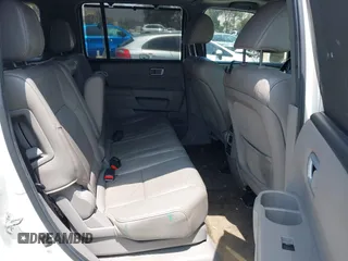 2013 Honda Pilot Touring with VIN 5FNYF3H93DB017954, listed as a IAAI auction lot 42185556 with 174,929 mi miles and . Bid and sale history available at carsss.com. Image 8.