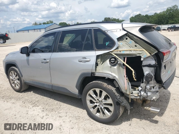 2021 Toyota RAV4 XLE Premium z VIN 2T3C1RFV9MW104408, wystawiony jako Copart lot #64117035 z przebiegiem 54 946 mil mil oraz Szkoda całkowita • Salvage title. Historia ofert i sprzedaży dostępna na DreamBid. Obrazek 2.