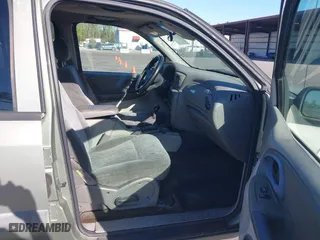2004 Chevrolet TrailBlazer LS with VIN 1GNDT13S942209802, listed as a IAAI auction lot 41842521 with 197,319 mi miles. Bid and sale history available at carsss.com. Image 5.