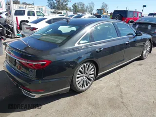 2019 Audi A8 z VIN WAU8DAF83KN006534, wystawiony jako IAAI lot #41712610 z przebiegiem 52 263 mil mil oraz . Historia ofert i sprzedaży dostępna na DreamBid. Obrazek 4.