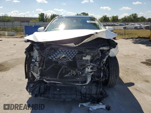 2020 Lexus RX with VIN 2T2HGMDA2LC050011, listed as a Copart auction lot 50695395 with 75,567 mi miles and Salvage Title. Bid and sale history available at carsss.com. Image 5.