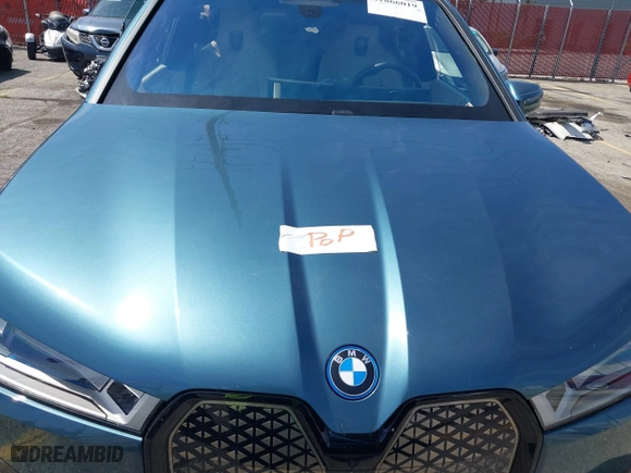 2022 BMW iX xDrive50 with VIN WB523CF09NCK59676, listed as a IAAI auction lot 41866019 with 1 mi miles. Bid and sale history available at carsss.com. Image 10.