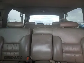 1997 Chevrolet Suburban with VIN 3GNFK16RXVG133472, listed as a Copart auction lot 48998175 with 180,543 mi miles and Salvage Title. Bid and sale history available at carsss.com. Image 10.