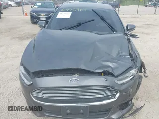 2016 Ford Fusion SE with VIN 3FA6P0T99GR276791, listed as a IAAI auction lot 42445910 with 117,355 mi miles and . Bid and sale history available at DreamBid. Image 12.