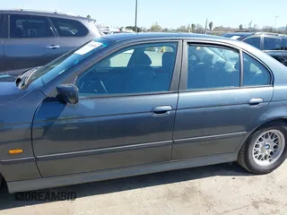 2000 BMW 5 Series 528iA with VIN WBADM6343YGV01651, listed as a IAAI auction lot 41745574 with 143,898 mi miles. Bid and sale history available at carsss.com. Image 14.