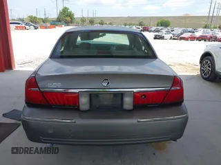 2001 Mercury Grand Marquis GS z VIN 2MEFM74W41X702619, wystawiony jako IAAI lot #42323749 z przebiegiem 124 748 mil mil oraz . Historia ofert i sprzedaży dostępna na DreamBid. Obrazek 17.