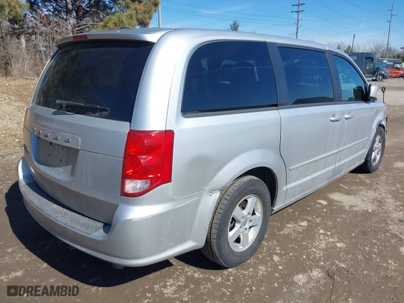 2011 Dodge Grand Caravan Mainstreet with VIN 2D4RN3DG0BR790008, listed as a IAAI auction lot 41701154 with 117,971 mi miles. Bid and sale history available at carsss.com. Image 4.