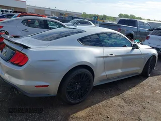 2018 Ford Mustang GT z VIN 1FA6P8CF4J5182655, wystawiony jako IAAI lot #42084037 z przebiegiem 57 987 mil mil oraz . Historia ofert i sprzedaży dostępna na DreamBid. Obrazek 14.