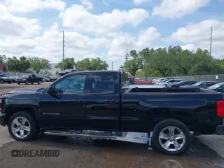 2018 Chevrolet Silverado 1500 Custom with VIN 1GCRCPEC3JZ329430, listed as a IAAI auction lot 42122097 with 199,580 mi miles. Bid and sale history available at carsss.com. Image 14.