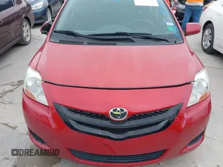 2007 Toyota Yaris with VIN JTDBT903071077664, listed as a IAAI auction lot 42175827 with 154,079 mi miles. Bid and sale history available at carsss.com. Image 10.