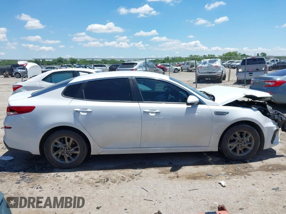 2019 Kia Optima LX z VIN 5XXGT4L38KG372576, wystawiony jako IAAI lot #42248090 z przebiegiem 98 368 mil mil oraz . Historia ofert i sprzedaży dostępna na DreamBid. Obrazek 13.