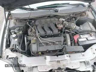 2002 Mercury Sable LS Premium with VIN 1MEFM55S32G620355, listed as a IAAI auction lot 41961390 with 165,204 mi miles and . Bid and sale history available at carsss.com. Image 10.