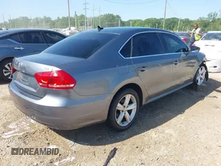 2015 Volkswagen Passat 1.8T Wolfsburg Ed with VIN 1VWAT7A3XFC115934, listed as a IAAI auction lot 41948035 with 243,143 mi miles. Bid and sale history available at carsss.com. Image 4.