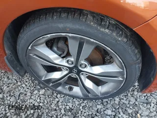 2012 Hyundai Veloster w/Black Int with VIN KMHTC6AD5CU044657, listed as a IAAI auction lot 41896892 with 115,846 mi miles and . Bid and sale history available at DreamBid. Image 6.