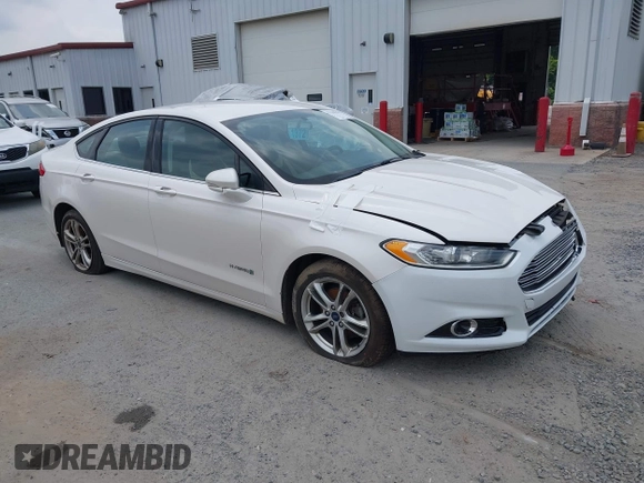 2015 Ford Fusion SE Hybrid with VIN 3FA6P0LU2FR305597, listed as a IAAI auction lot 42168292 with 97,688 mi miles and . Bid and sale history available at DreamBid. Image 1.