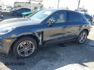 2021 Porsche Macan with VIN WP1AA2A58MLB04780, listed as a IAAI auction lot 41674377 with 55,946 mi miles and . Bid and sale history available at DreamBid. Image 6.