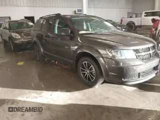 2018 Dodge Journey SE with VIN 3C4PDCAB1JT519745, listed as a IAAI auction lot 41366307 with 131,436 mi miles. Bid and sale history available at carsss.com. Image 1.