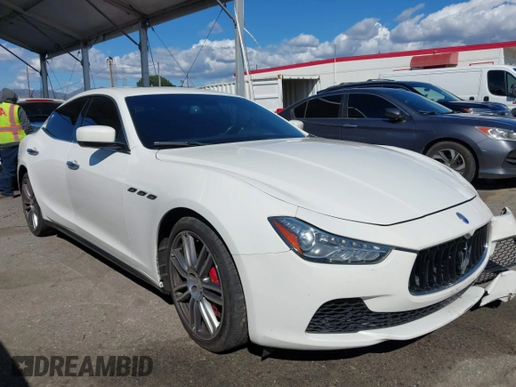 2015 Maserati Ghibli z VIN ZAM57XSA8F1161212, wystawiony jako IAAI lot #41746084 z przebiegiem 57 169 mil mil oraz . Historia ofert i sprzedaży dostępna na DreamBid. Obrazek 1.