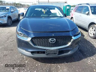 2023 Mazda CX-30 S with VIN 3MVDMBAM1PM583896, listed as a IAAI auction lot 41732091 with 26,298 mi miles and . Bid and sale history available at carsss.com. Image 12.
