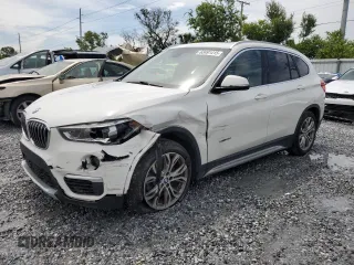 2017 BMW X1 xDrive28i with VIN WBXHT3Z37H4A55614, listed as a Copart auction lot 63491415 with 120,680 mi miles and Salvage title. Bid and sale history available at DreamBid. Image 1.