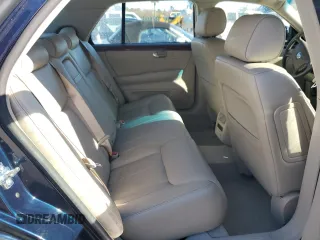 2006 Cadillac DTS 1SB z VIN 1G6KD57Y56U220535, wystawiony jako Copart lot #89196185 z przebiegiem 94 312 mil mil oraz Szkody całkowita. Historia ofert i sprzedaży dostępna na DreamBid. Obrazek 10.