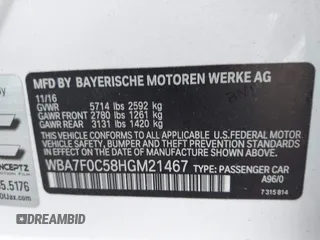 2017 BMW 7 Series 750i with VIN WBA7F0C58HGM21467, listed as a IAAI auction lot 41632663 with 136,620 mi miles. Bid and sale history available at carsss.com. Image 9.