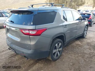 2018 Chevrolet Traverse LT Leather with VIN 1GNERHKW7JJ109487, listed as a IAAI auction lot 41583909 with 138,836 mi miles. Bid and sale history available at carsss.com. Image 4.