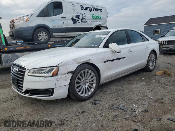 2015 Audi A8 z VIN WAUJGAFD9FN003570, wystawiony jako Copart lot #87642905 z przebiegiem 71 523 mil mil oraz Czysty tytuł • Clean title. Historia ofert i sprzedaży dostępna na DreamBid. Obrazek 1.