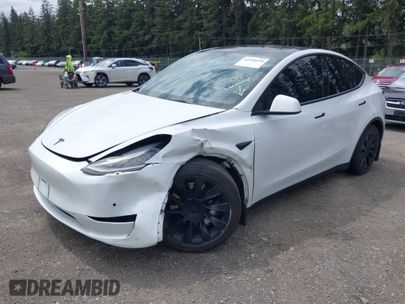 2022 Tesla Model Y Long Range z VIN 7SAYGDEE9NF494901, wystawiony jako IAAI lot #42310520 z przebiegiem 62 515 mil mil oraz . Historia ofert i sprzedaży dostępna na DreamBid. Obrazek 2.