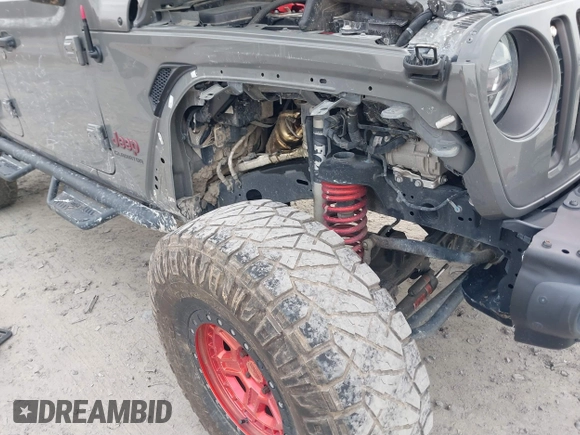 2021 Jeep Gladiator Rubicon with VIN 1C6JJTBG7ML554354, listed as a IAAI auction lot 41796943 with 61,513 mi miles and . Bid and sale history available at DreamBid. Image 6.
