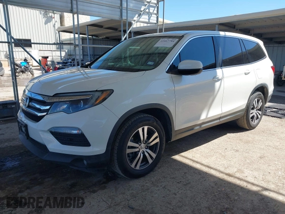 2018 Honda Pilot EX-L with VIN 5FNYF5H54JB009785, listed as a IAAI auction lot 41667784 with 67,296 mi miles. Bid and sale history available at carsss.com. Image 17.