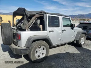 2007 Jeep Wrangler Unlimited X with VIN 1J8GB39157L142982, listed as a Copart auction lot 82050134 with 72,666 mi miles and Salvage Title. Bid and sale history available at DreamBid. Image 3.