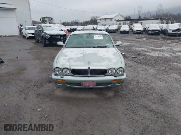 1998 Jaguar XJ with VIN SAJHN1242WC819689, listed as a IAAI auction lot 41148530 with 60,143 mi miles and . Bid and sale history available at DreamBid. Image 12.