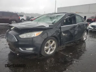 2017 Ford Focus Titanium z VIN 1FADP3J26HL242435, wystawiony jako Copart lot #63705965 z przebiegiem 158 221 mil mil oraz Szkoda całkowita • Salvage title. Historia ofert i sprzedaży dostępna na DreamBid. Obrazek 1.