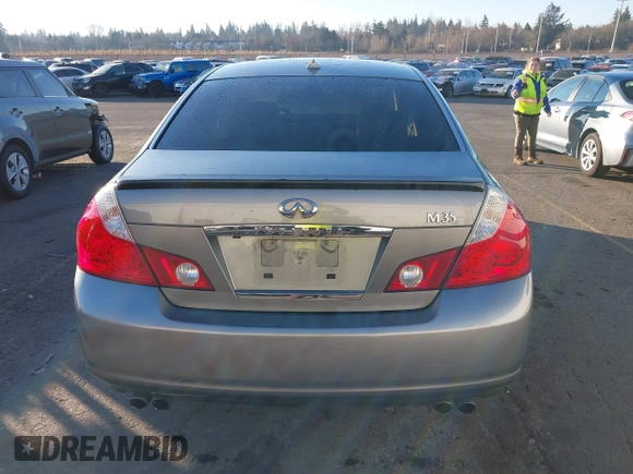 2006 Infiniti M z VIN JNKAY01E56M107083, wystawiony jako IAAI lot #41443347 z przebiegiem 162 191 mil mil oraz . Historia ofert i sprzedaży dostępna na DreamBid. Obrazek 16.