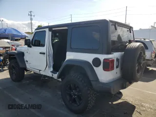 2019 Jeep Wrangler Unlimited Sport Altitude with VIN 1C4HJXDG2KW675235, listed as a Copart auction lot 54389785 with 88,825 mi miles and Salvage title. Bid and sale history available at DreamBid. Image 2.
