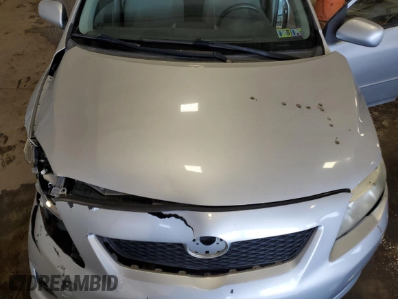2010 Toyota Corolla with VIN 1NXBU4EE9AZ359085, listed as a Copart auction lot 62379755 with 107,160 mi miles and Salvage title. Bid and sale history available at DreamBid. Image 11.