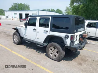 2015 Jeep Wrangler Unlimited Rubicon z VIN 1C4BJWFGXFL755810, wystawiony jako IAAI lot #42495531 z przebiegiem 109 668 mil mil oraz . Historia ofert i sprzedaży dostępna na DreamBid. Obrazek 3.