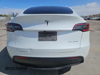 2024 Tesla Model Y Long Range with VIN 7SAYGAEE7RF205700, listed as a Copart auction lot 53814155 with 8,986 mi miles and Salvage Title. Bid and sale history available at DreamBid. Image 6.