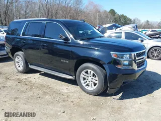 2018 Chevrolet Tahoe LT with VIN 1GNSCBKC7JR254859, listed as a IAAI auction lot 41620074 with 124,714 mi miles. Bid and sale history available at carsss.com. Image 1.