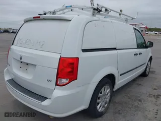 2014 Ram Cargo Van Tradesman with VIN 2C4JRGAG9ER406306, listed as a IAAI auction lot 41928370 with 174,352 mi miles. Bid and sale history available at carsss.com. Image 4.