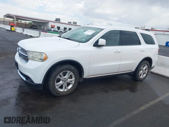2013 Dodge Durango SXT with VIN 1C4RDJAG7DC659050, listed as a IAAI auction lot 42637236 with 162,458 mi miles and . Bid and sale history available at DreamBid. Image 14.