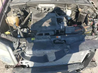 2009 Mercury Mariner Premier z VIN 4M2CU87G49KJ11181, wystawiony jako Copart lot #70799534 z przebiegiem 167 273 mil mil oraz Szkoda całkowita • Salvage title. Historia ofert i sprzedaży dostępna na DreamBid. Obrazek 12.