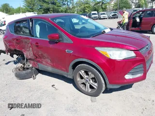 2014 Ford Escape SE with VIN 1FMCU9GX9EUB53450, listed as a IAAI auction lot 42313152 with 138,367 mi miles and . Bid and sale history available at DreamBid. Image 1.