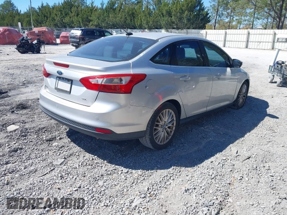 2012 Ford Focus SEL with VIN 1FAHP3H29CL114884, listed as a IAAI auction lot 41785864 with 180,095 mi miles. Bid and sale history available at carsss.com. Image 4.