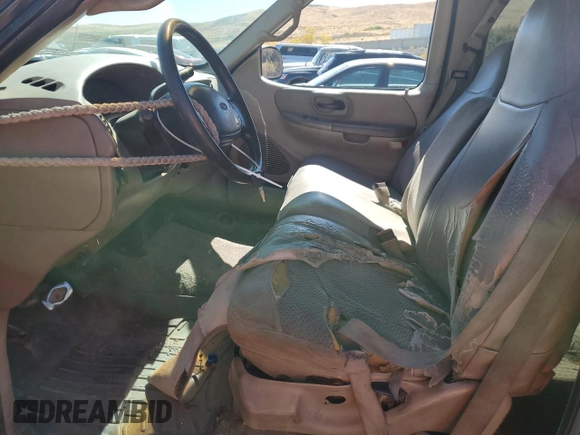 2000 Ford F-150 XL with VIN 1FTRX18L7YKA42575, listed as a Copart auction lot 73034804 with 263,959 mi miles and Non repairable. Bid and sale history available at DreamBid. Image 7.