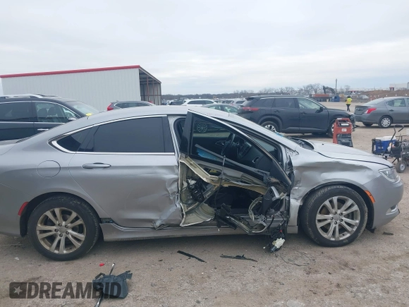2015 Chrysler 200 Limited with VIN 1C3CCCAB7FN670991, listed as a IAAI auction lot 41625738 with 194,534 mi miles and . Bid and sale history available at DreamBid. Image 13.