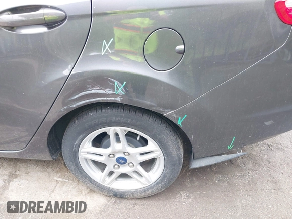 2019 Ford Fiesta SE z VIN 3FADP4BJ7KM155094, wystawiony jako IAAI lot #42186126 z przebiegiem 93 684 mil mil oraz . Historia ofert i sprzedaży dostępna na DreamBid. Obrazek 17.