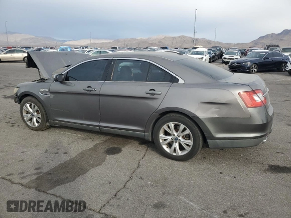 2011 Ford Taurus SEL with VIN 1FAHP2EW9BG168338, listed as a Copart auction lot 42991785 with 183,620 mi miles and Salvage Title. Bid and sale history available at carsss.com. Image 2.