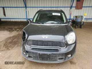 2014 MINI Countryman S with VIN WMWZC5C56EWP38065, listed as a Copart auction lot 59518395 with 91,106 mi miles and Salvage title. Bid and sale history available at DreamBid. Image 5.